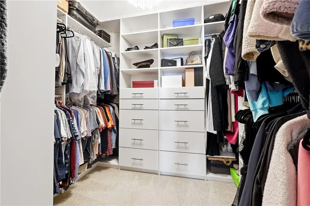 Primary Custom Closet added for the ultimate organization and high end touches.