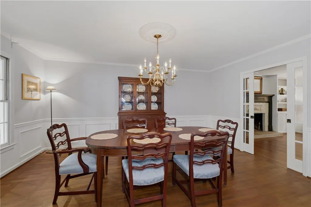 HUGE dining room! Easily seats 12. Pocket french doors to family room.