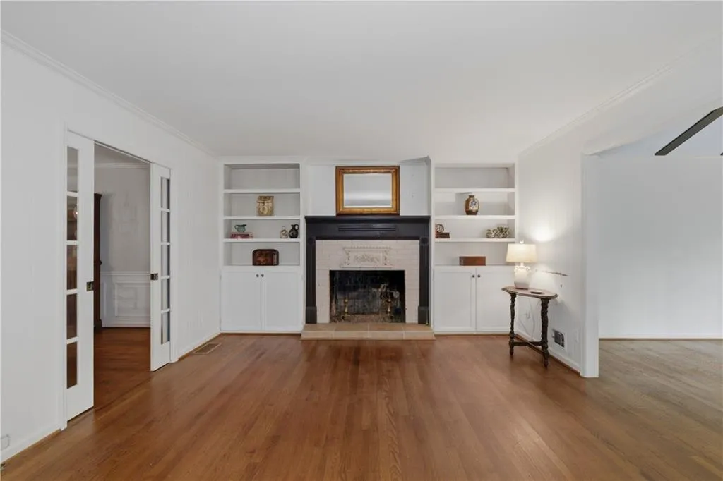 Warm family room adjoins dining room and opens to sunroom