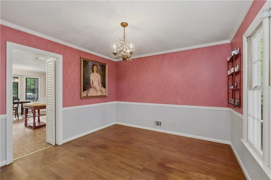 Previously the dining room, this room could be a great office or den!