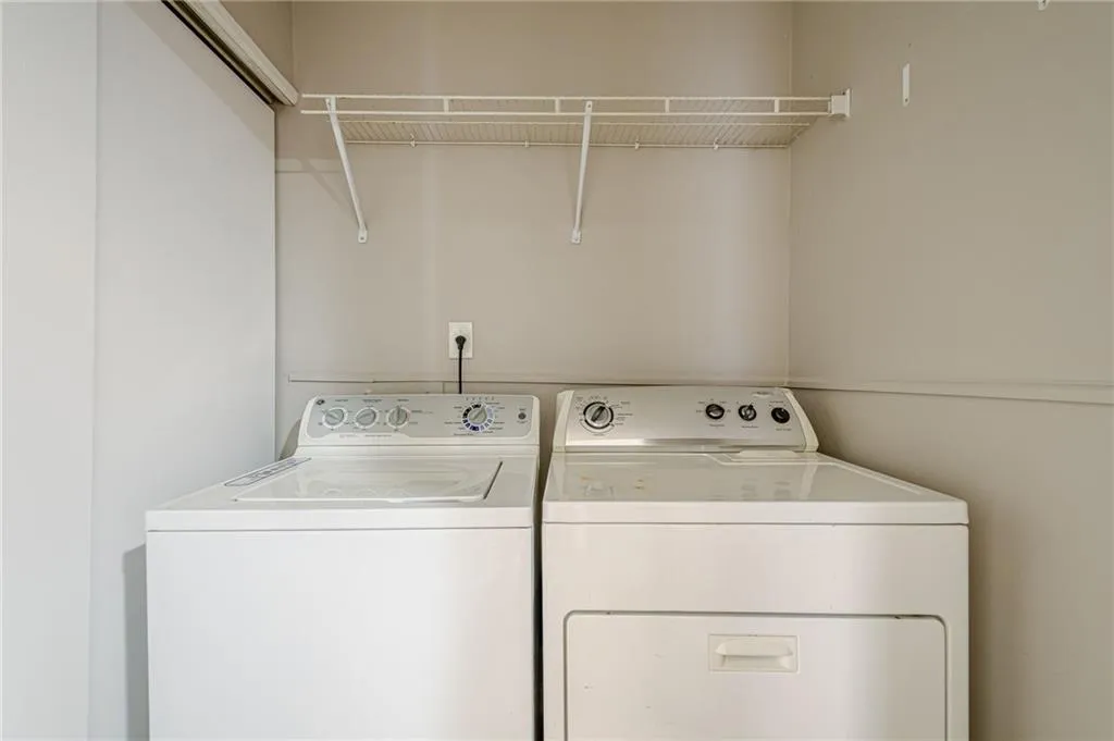 Laundry area featuring washer and clothes dryer