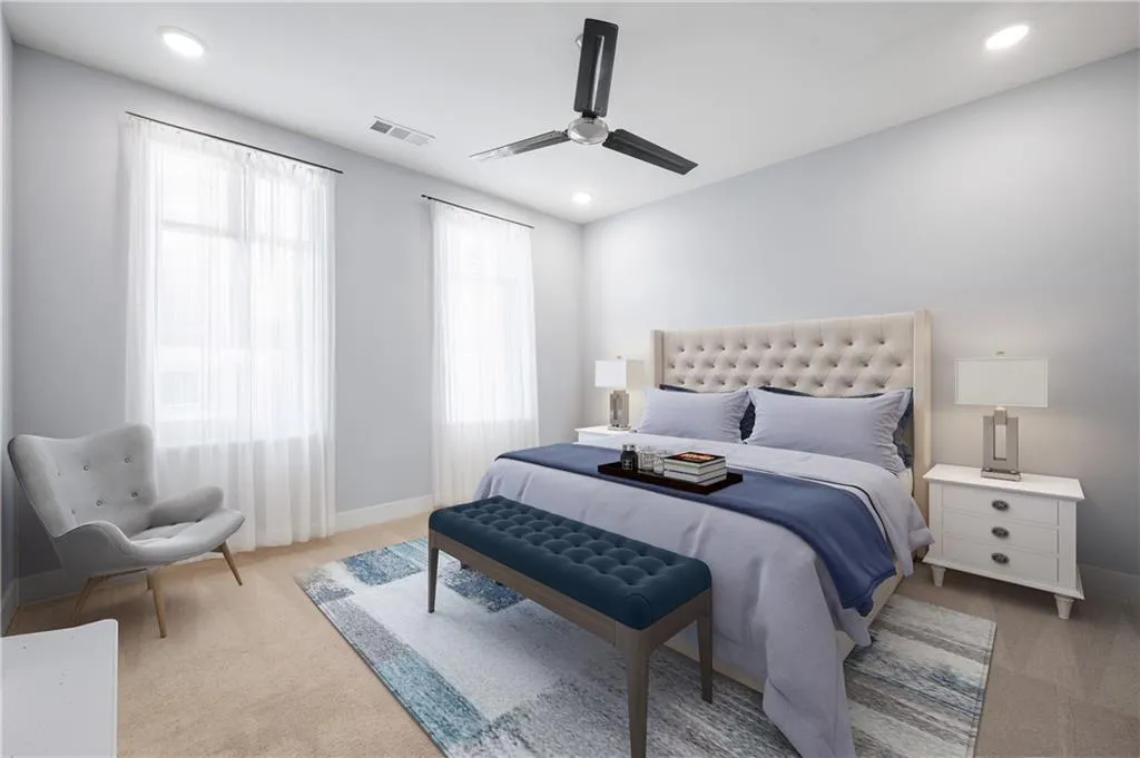 Bedroom featuring light carpet, a ceiling fan, visible vents, and recessed lighting