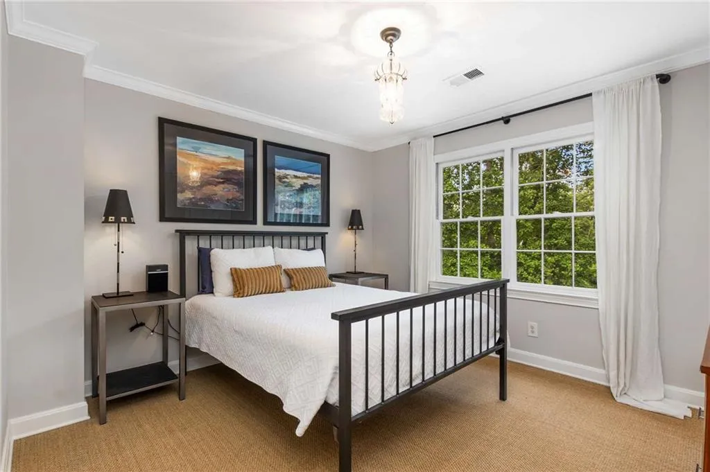 The secondary bedrooms feature natural sisal flooring