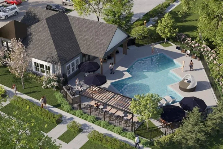 Community pool with a patio area