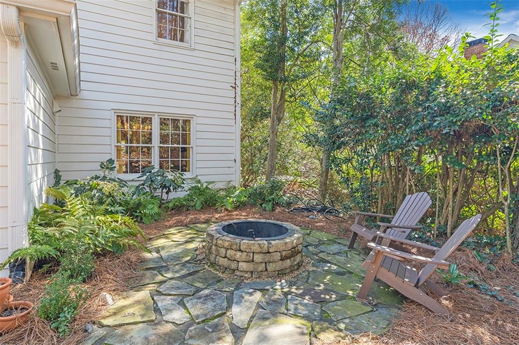 View of patio / terrace with an outdoor fire pit