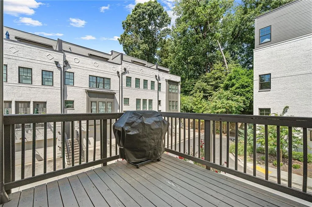 Wooden terrace with a grill