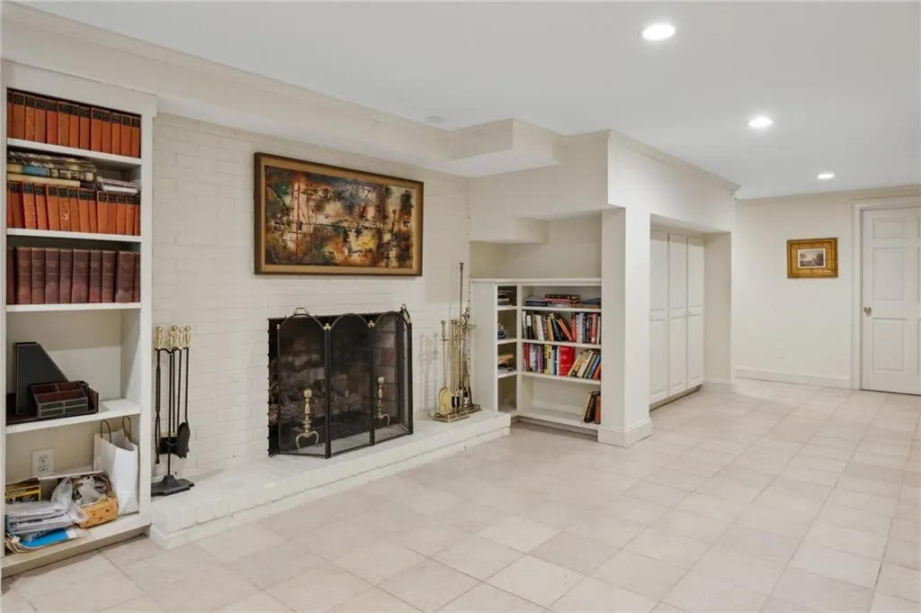 Terrace level with fireplace and easy-to-maintain tile floor