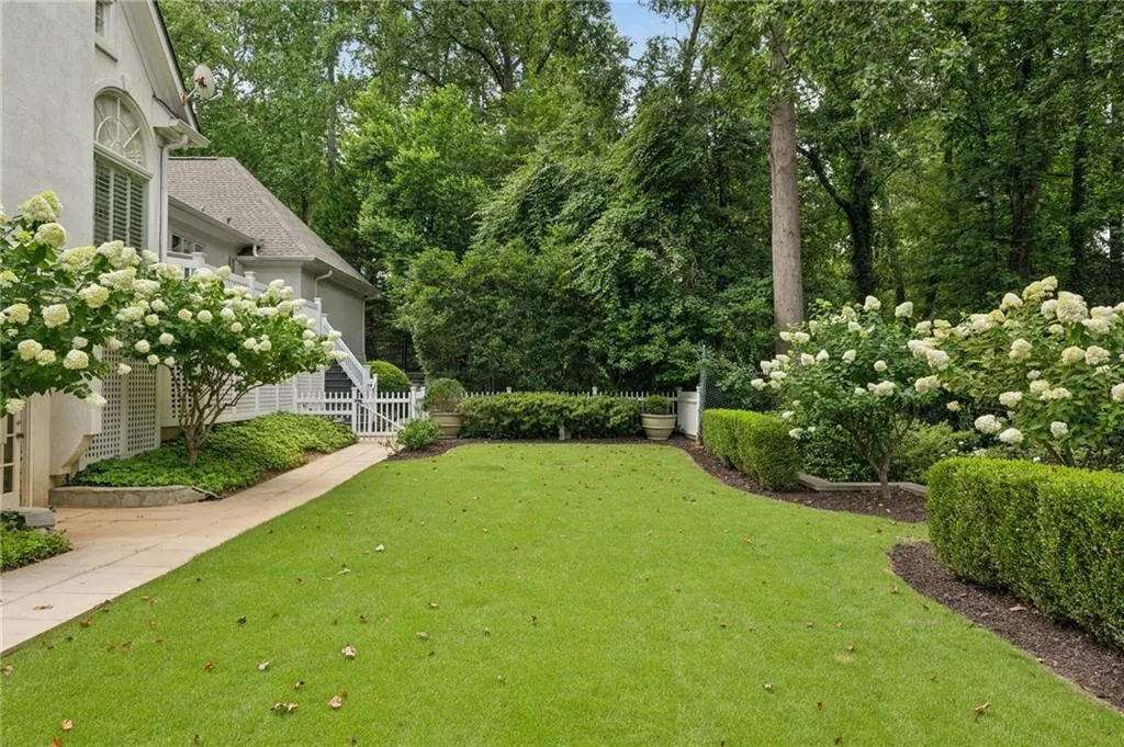 Grassy flat yard - perfect for croquet or kids' play area