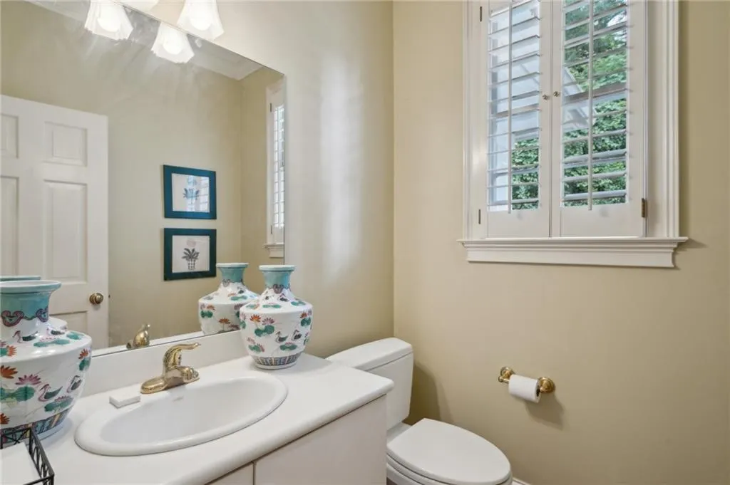 Powder room at the back garage entry