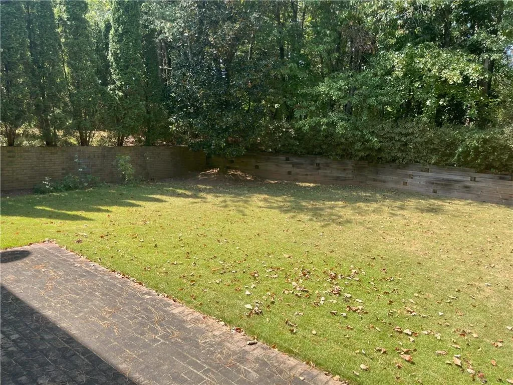 View of fenced backyard