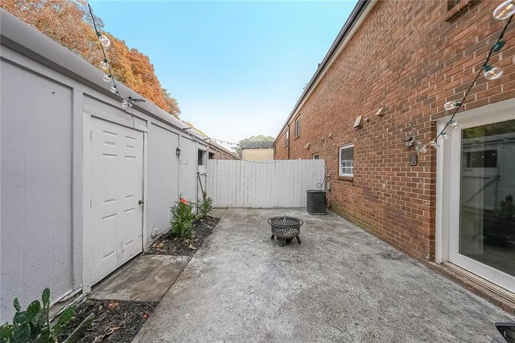 View of patio / terrace featuring an outdoor fire pit