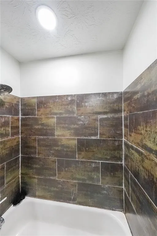 Bathroom with tub / shower combination