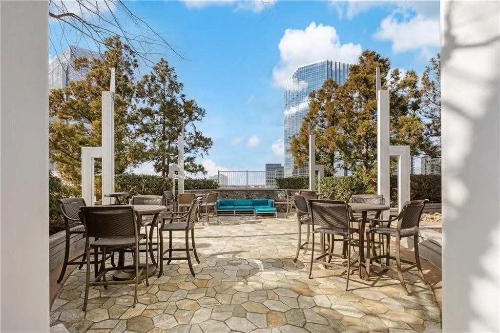 View of patio featuring outdoor dining space and outdoor lounge area