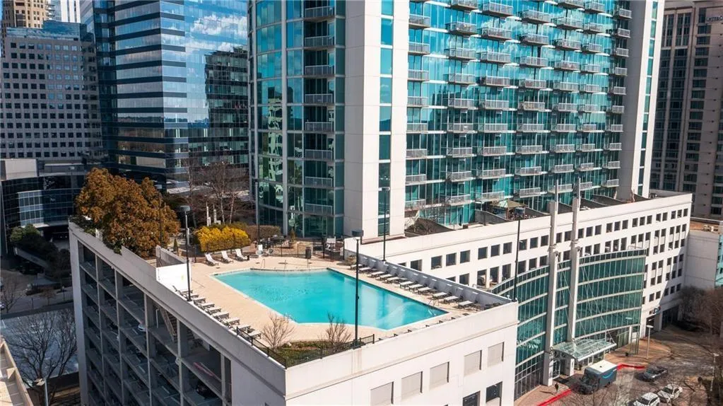 Pool featuring a view of city