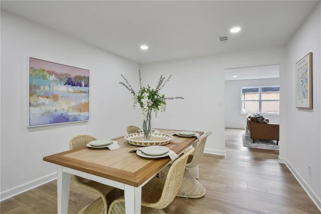 Dining area featuring hardwood / wood-style flooring