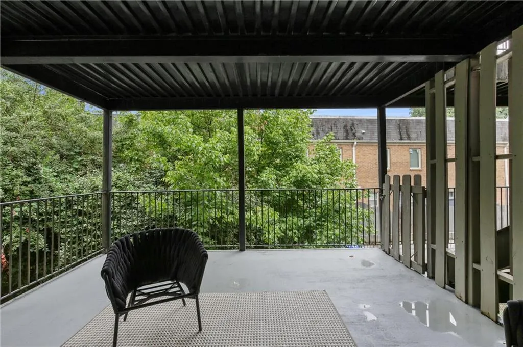 View of patio / terrace with a balcony