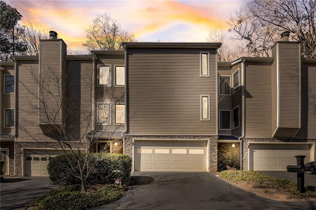 View of front of home featuring a garage