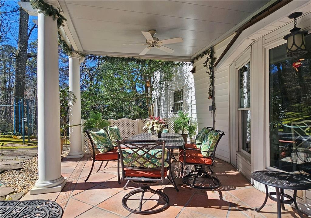 View of patio / terrace featuring ceiling fan