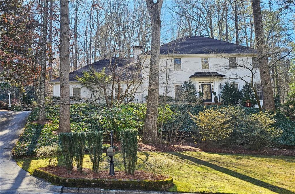 View of front of property with a front yard