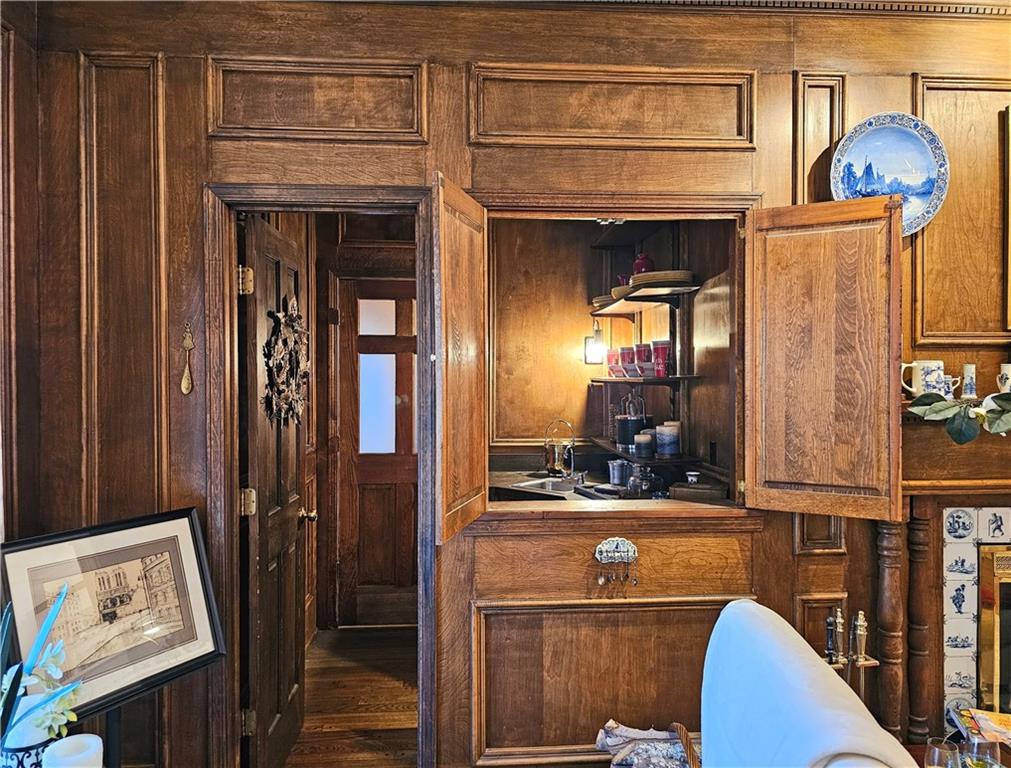 Office space featuring dark wood-type flooring