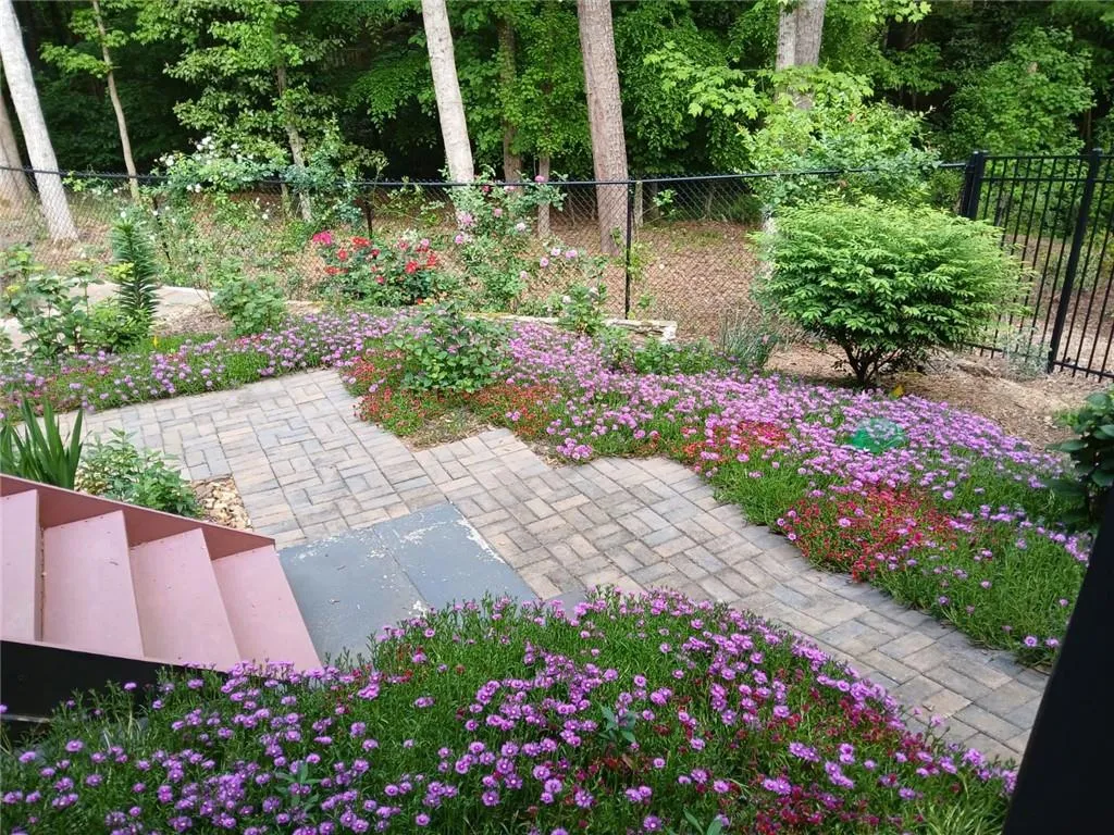 View of yard with a fenced backyard and a patio area