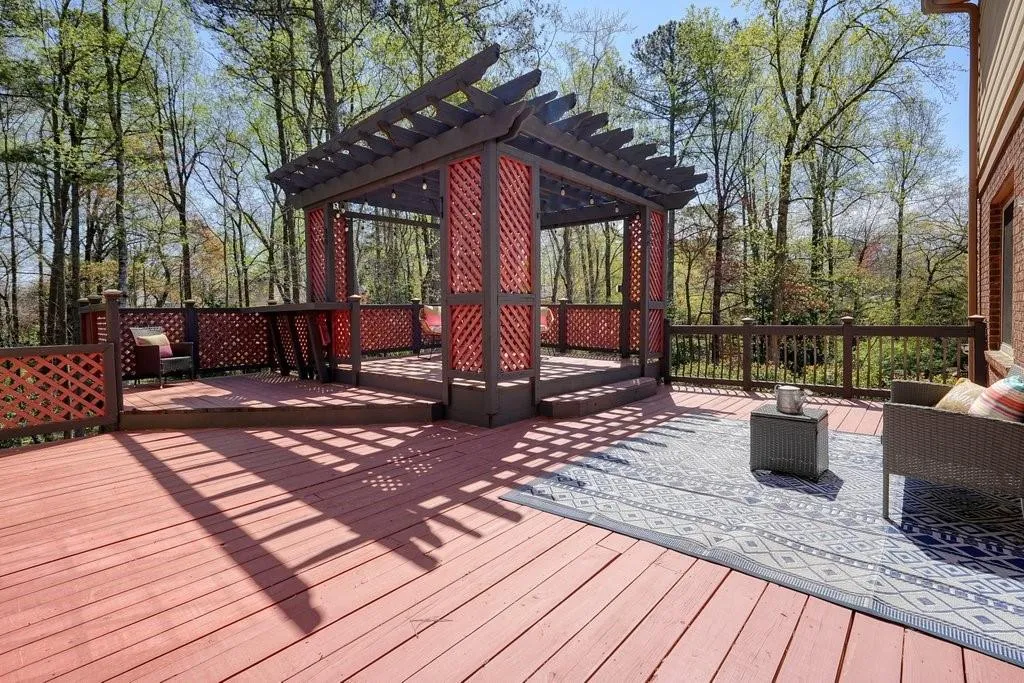 Deck featuring a pergola