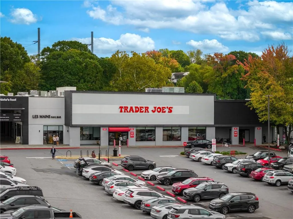 View of commercial location with uncovered parking