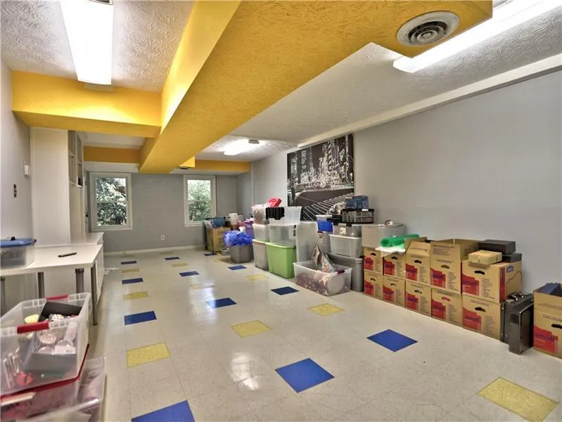 Basement with a textured ceiling