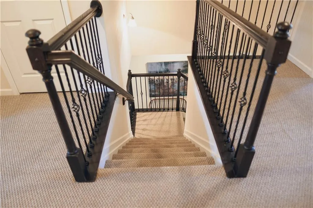 Staircase with carpet flooring
