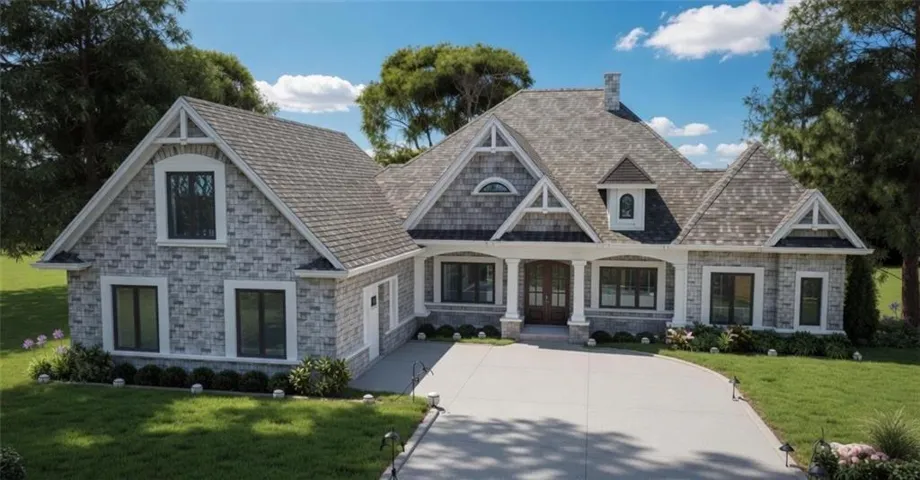 Stone and shake exterior with multiple gables and a prominent front entry