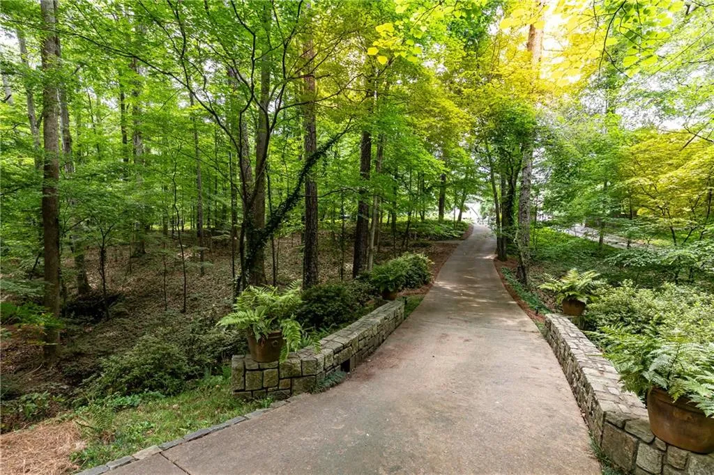 view of driveway from home to street