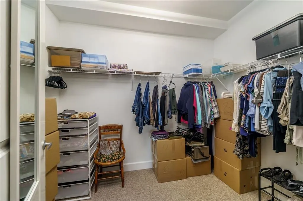Primary walk-in closet is huge! Primary walk-in closet is huge!