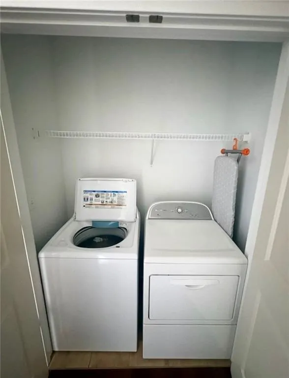Dedicated laundry closet with wire shelving