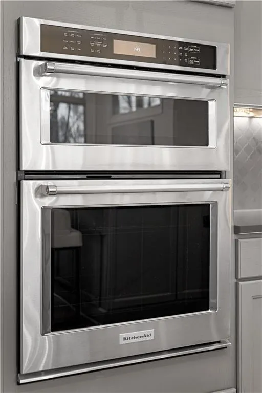 Interior details with backsplash and stainless steel double oven