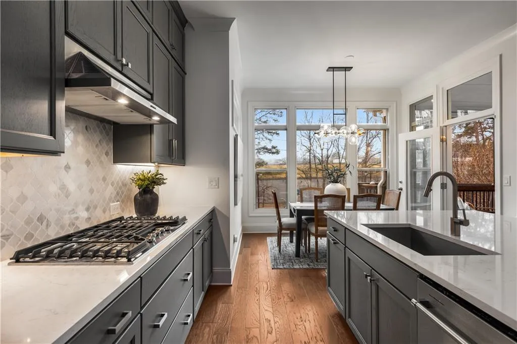 Lots of kitchen counter space and gas stove top.