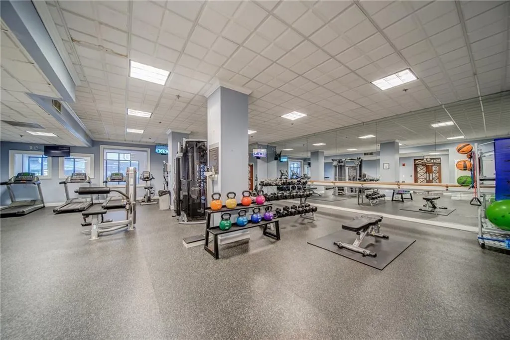 Exercise room featuring a paneled ceiling