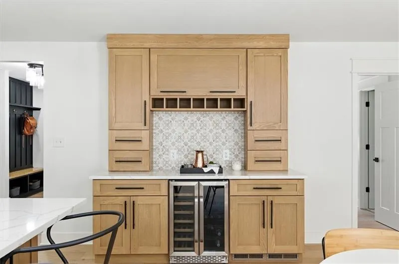 With additional cabinetry/storage