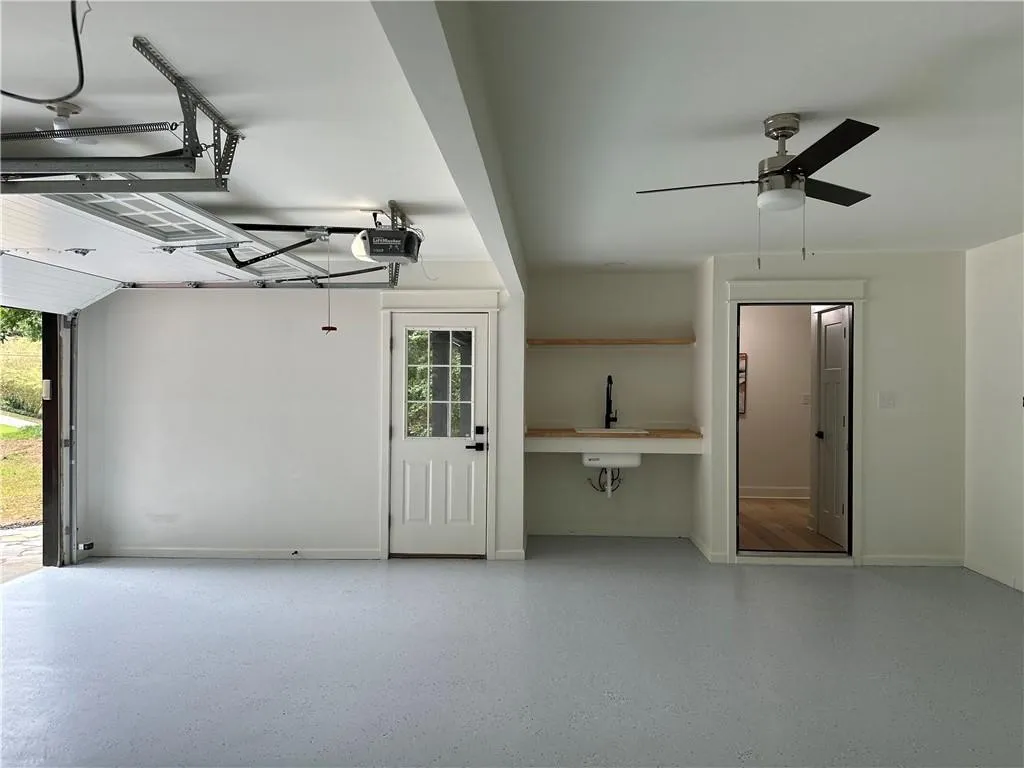 Garage has two doors for convenient access to the outdoors. Floor recently painted.