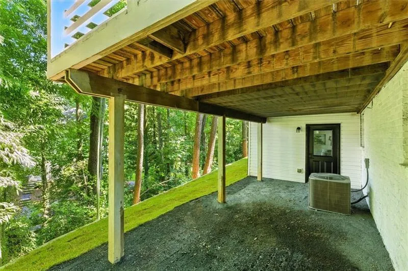Lower level living room/flex room extends to the outdoors.