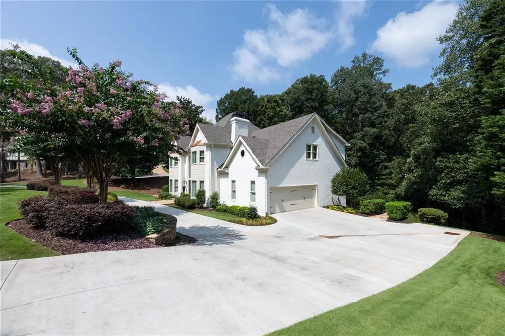 PPerfectly manicured lot greets you as you return home and park your car in an oversized side entry garage with a large storage space. Garage floor has a professionally installed polyaspartic (epoxy) floor.