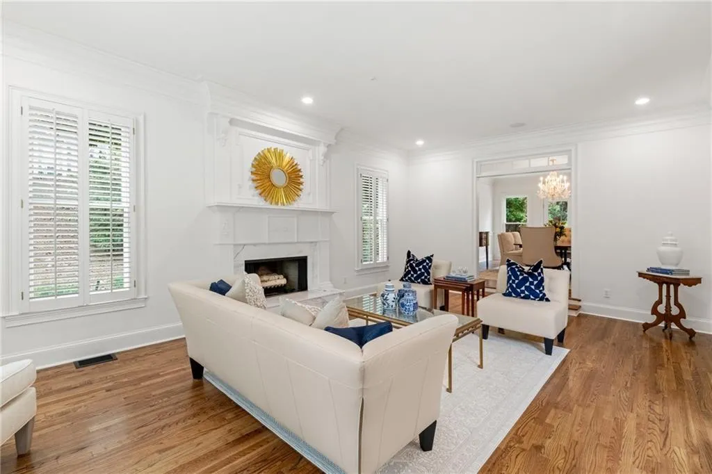 Living room with view towards the formal dining room.