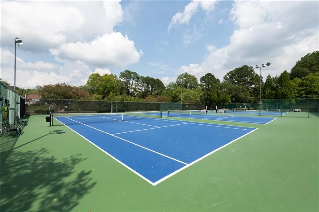 Four lighted tennis courts with one available for Pickleball play. Spalding Lake is a very active ALTA community.
