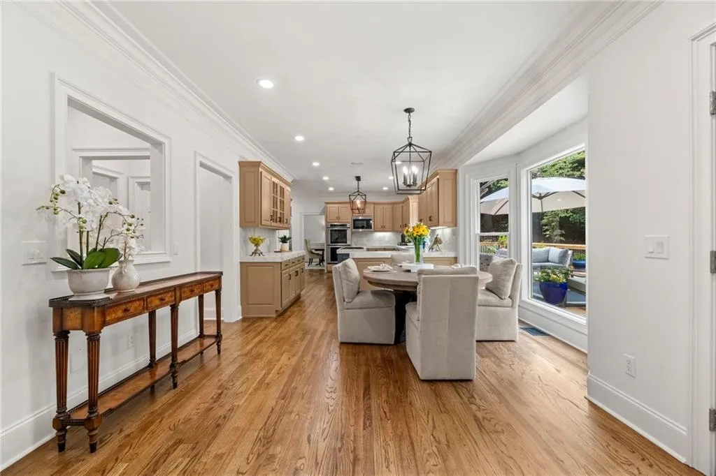 The breakfast area offers plenty of space for large table and great views towards the kitchen and outside. This is the perfect gathering area while hosting an event at your home.