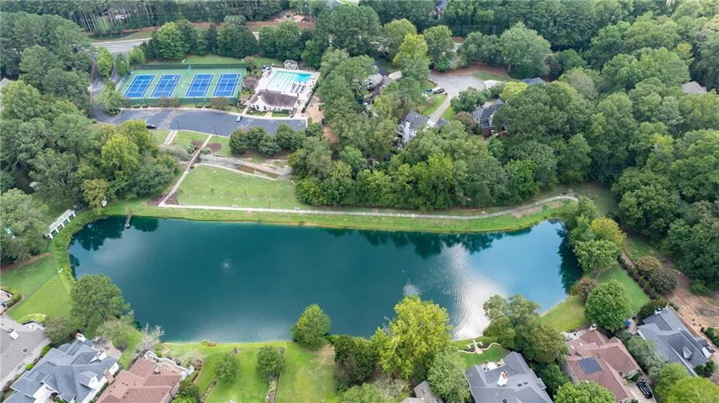 Spalding Lake community offers a picturesque stocked lake with walking paths and charming homes, creating the perfect setting for leisurely strolls, fishing, and serene neighborhood living. Community amenities are gated and only accessible to homeowners.