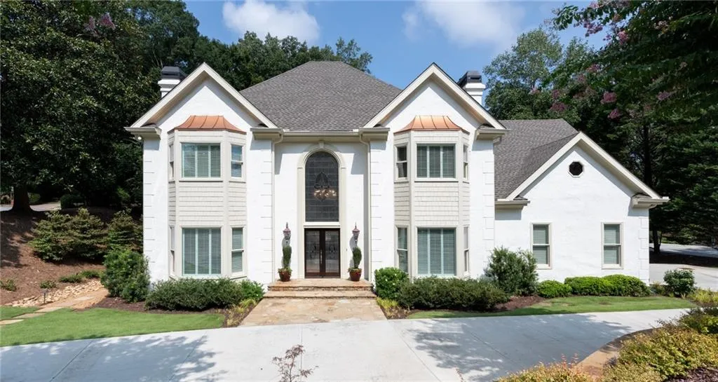 New 30-year architectural roof, HardiePlank bay windows and freshly painted exterior.