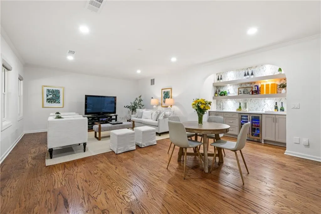 The basement has plenty of room not only for a media center but for other game activities such as ping pong, a foosball table, and shuffle board, etc.