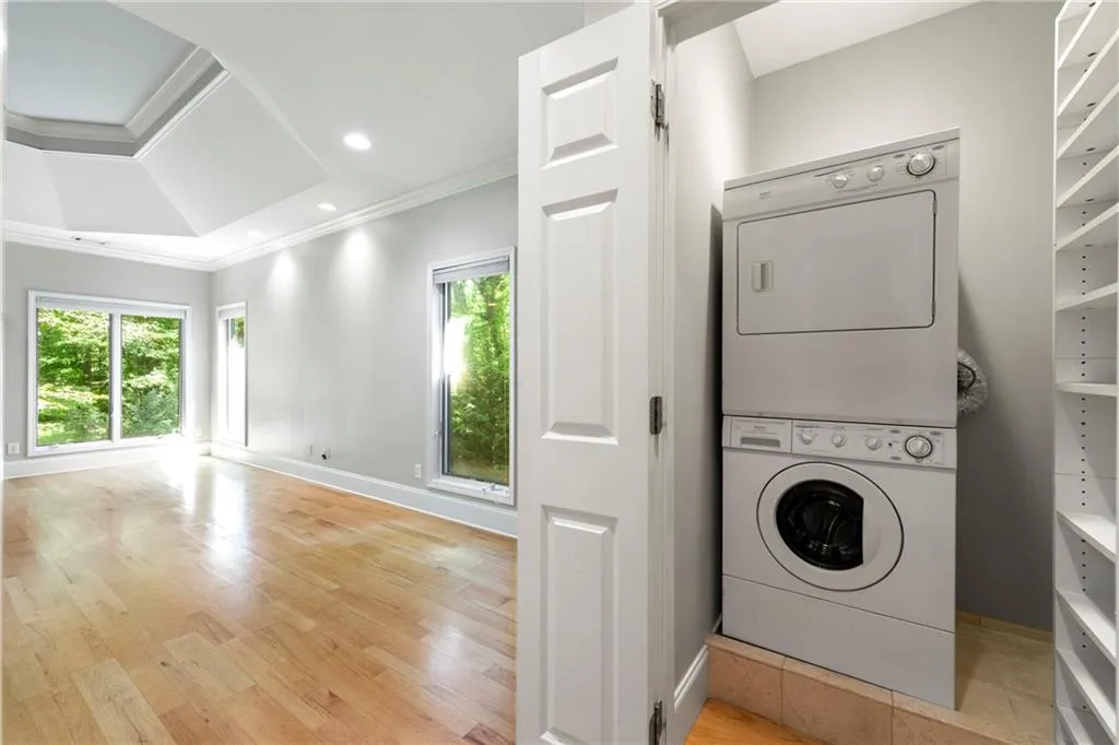 Private laundry closet in Primary Bedroom