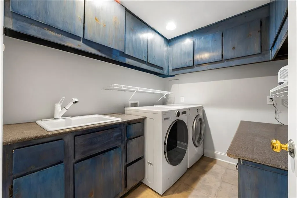 Full laundry room in basement