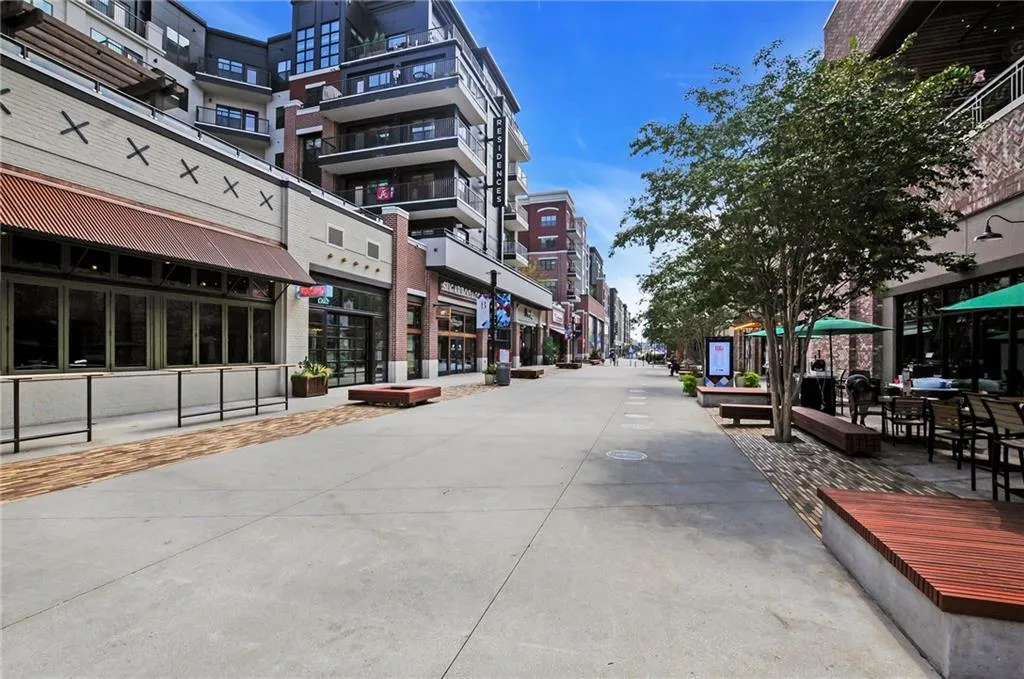 View of concrete street featuring sidewalks
