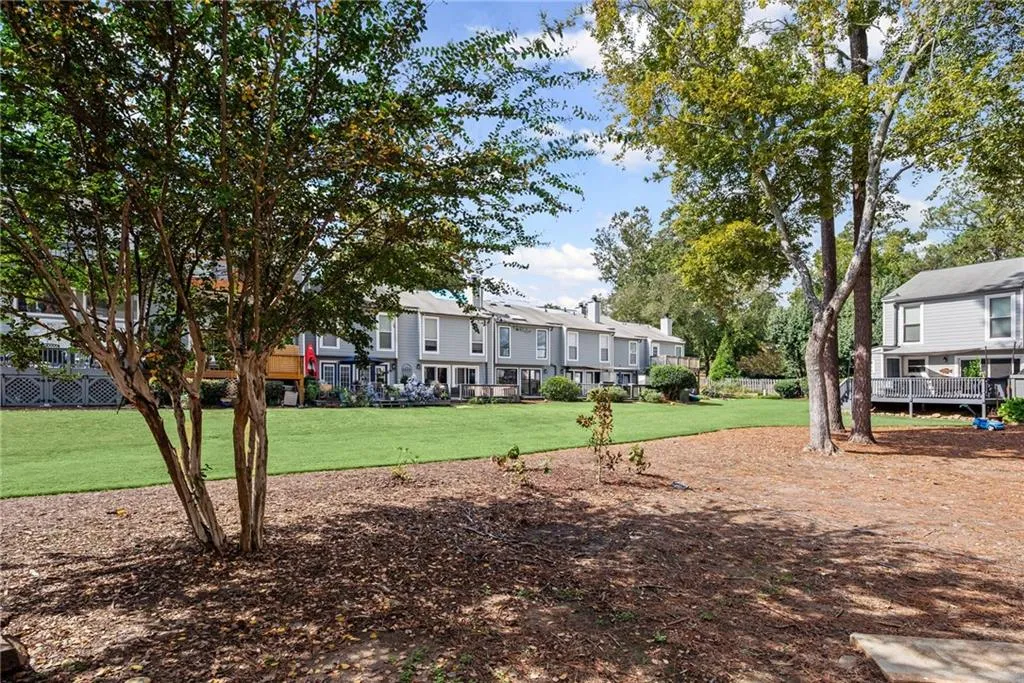 View of grassy yard with a residential view